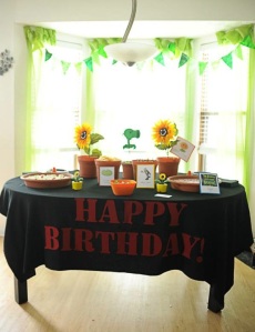 Fun table set-up! Happy Birthday Tablecloth embellished with felt.